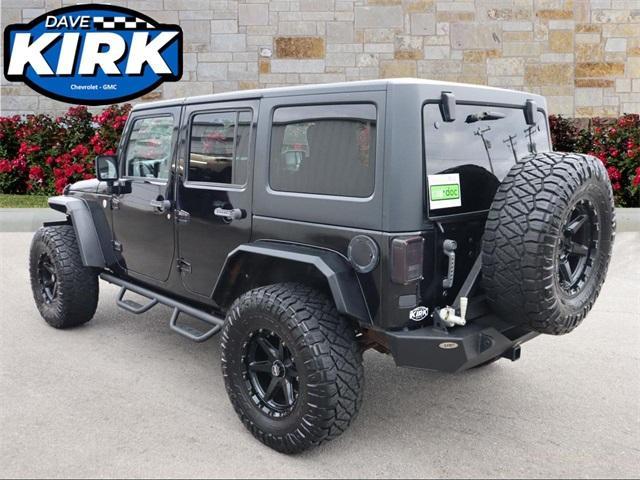 used 2011 Jeep Wrangler Unlimited car, priced at $15,290