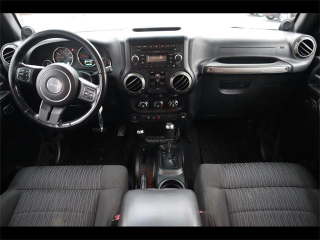 used 2011 Jeep Wrangler Unlimited car, priced at $15,290