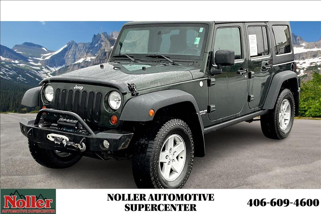 used 2011 Jeep Wrangler Unlimited car, priced at $16,336
