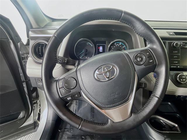 used 2016 Toyota RAV4 Hybrid car, priced at $20,000