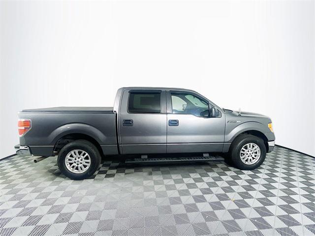 used 2013 Ford F-150 car, priced at $14,000