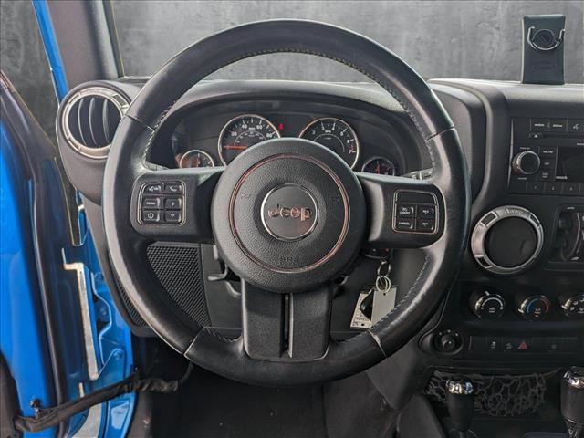 used 2015 Jeep Wrangler Unlimited car, priced at $21,491