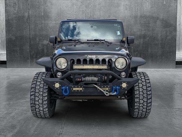 used 2014 Jeep Wrangler Unlimited car, priced at $16,512