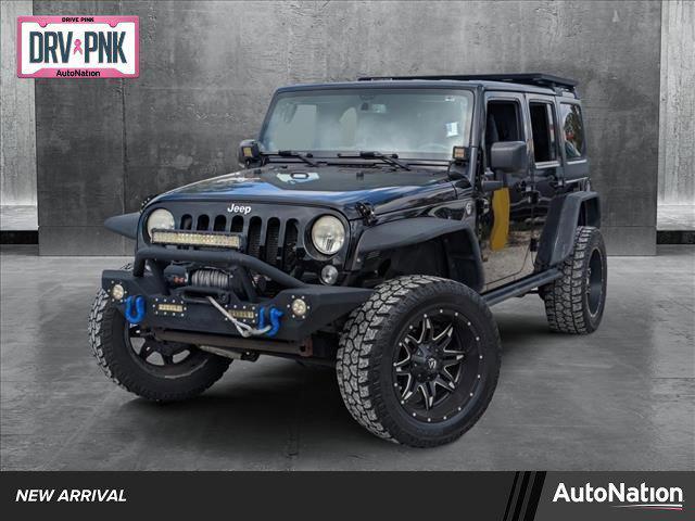 used 2014 Jeep Wrangler Unlimited car, priced at $16,512