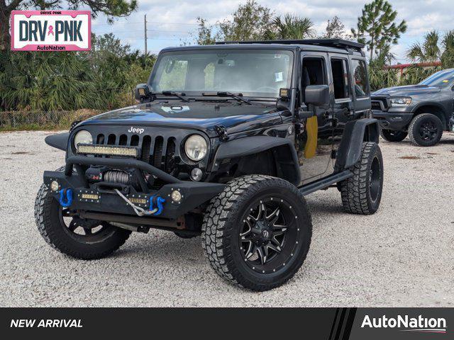 used 2014 Jeep Wrangler Unlimited car, priced at $16,512