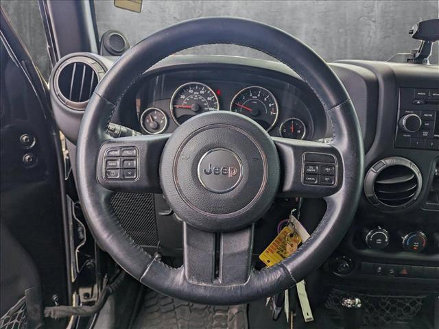 used 2014 Jeep Wrangler Unlimited car, priced at $16,512