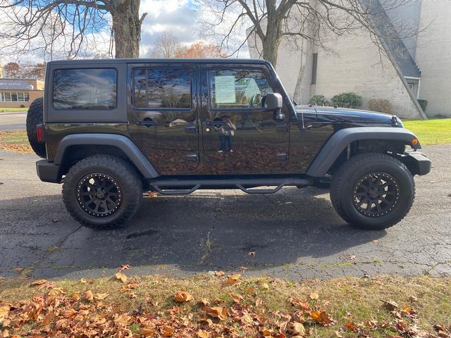 used 2013 Jeep Wrangler Unlimited car, priced at $14,995