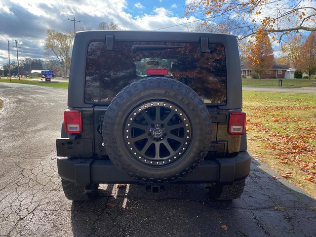 used 2013 Jeep Wrangler Unlimited car, priced at $14,995