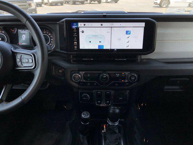 used 2024 Jeep Wrangler car, priced at $34,998