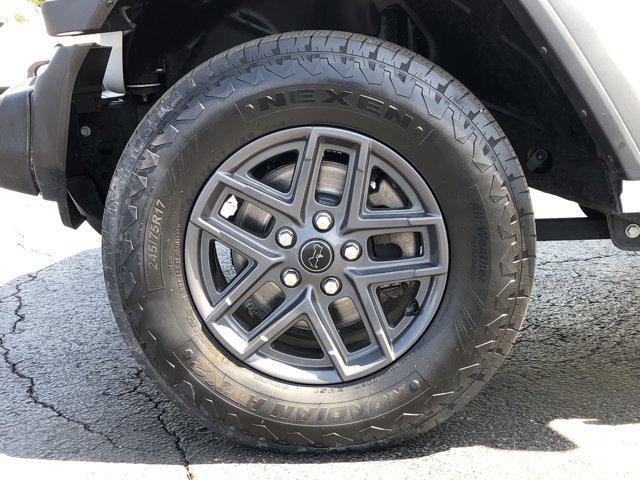 used 2024 Jeep Wrangler car, priced at $34,998