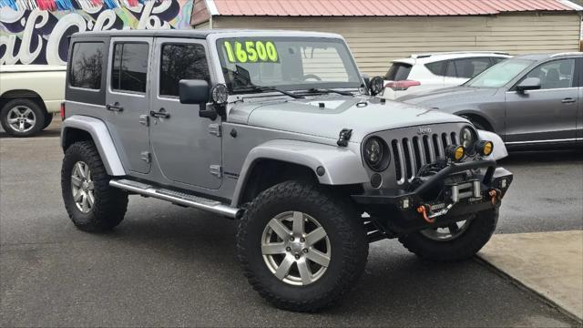 used 2013 Jeep Wrangler Unlimited car, priced at $15,900