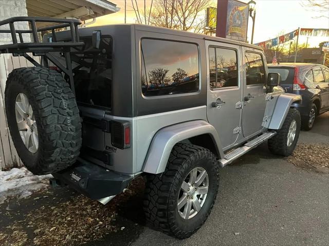 used 2013 Jeep Wrangler Unlimited car, priced at $17,900