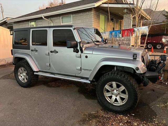 used 2013 Jeep Wrangler Unlimited car, priced at $17,900