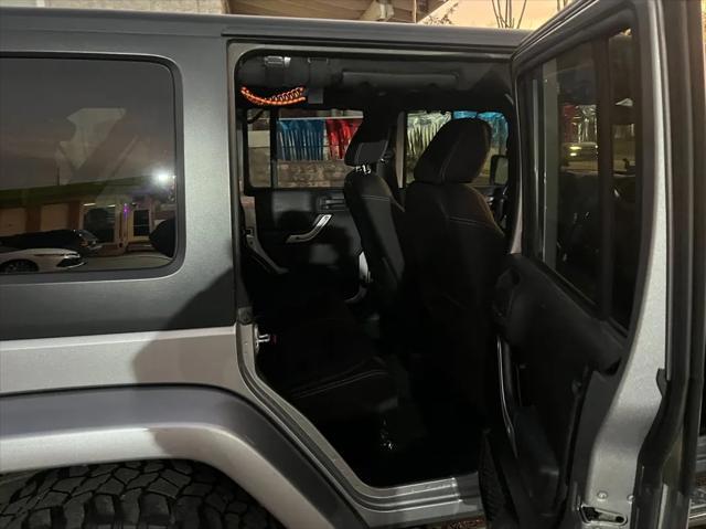 used 2013 Jeep Wrangler Unlimited car, priced at $17,900