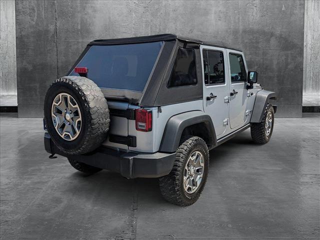 used 2014 Jeep Wrangler Unlimited car, priced at $23,154