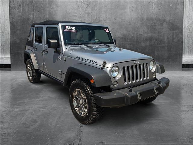 used 2014 Jeep Wrangler Unlimited car, priced at $23,154