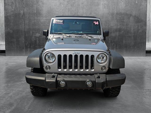 used 2014 Jeep Wrangler Unlimited car, priced at $23,154