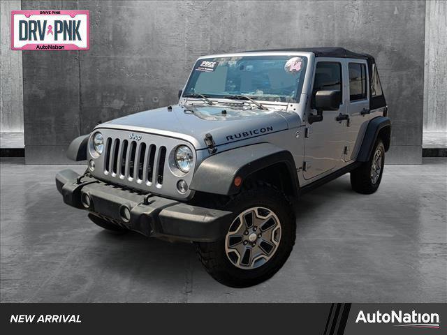 used 2014 Jeep Wrangler Unlimited car, priced at $23,154