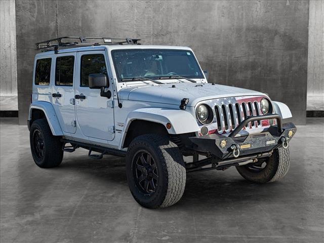 used 2013 Jeep Wrangler Unlimited car, priced at $11,991