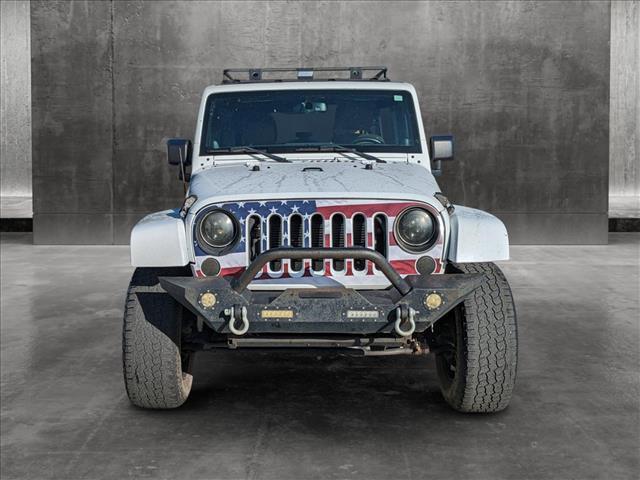 used 2013 Jeep Wrangler Unlimited car, priced at $11,991