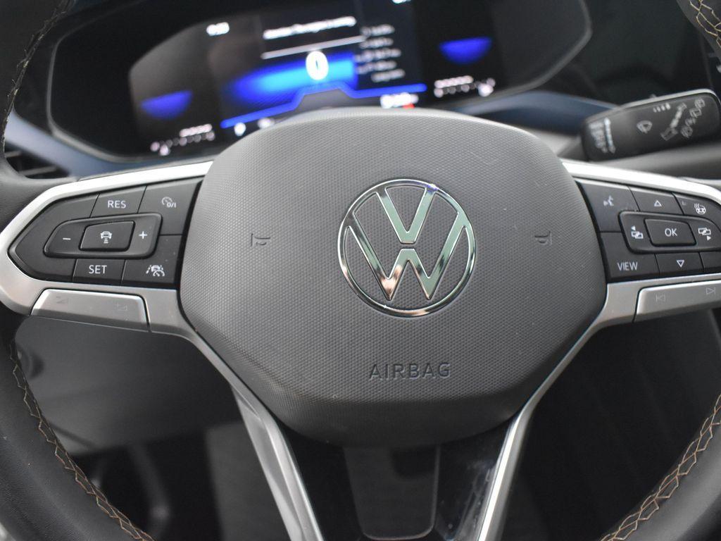 used 2023 Volkswagen Taos car, priced at $20,420
