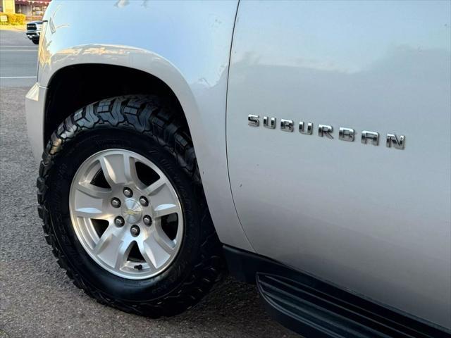 used 2014 Chevrolet Suburban car, priced at $13,995