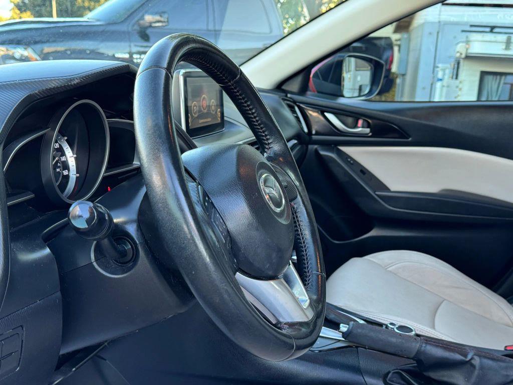 used 2015 Mazda Mazda3 car, priced at $10,495