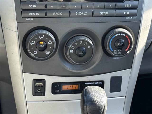 used 2011 Toyota Corolla car, priced at $5,000