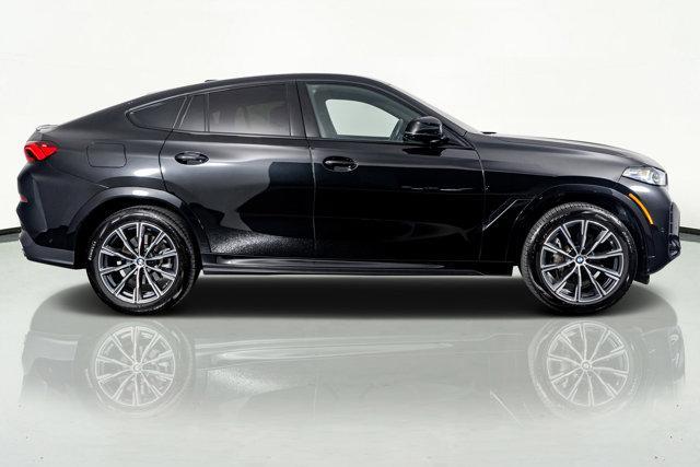used 2025 BMW X6 car, priced at $73,998