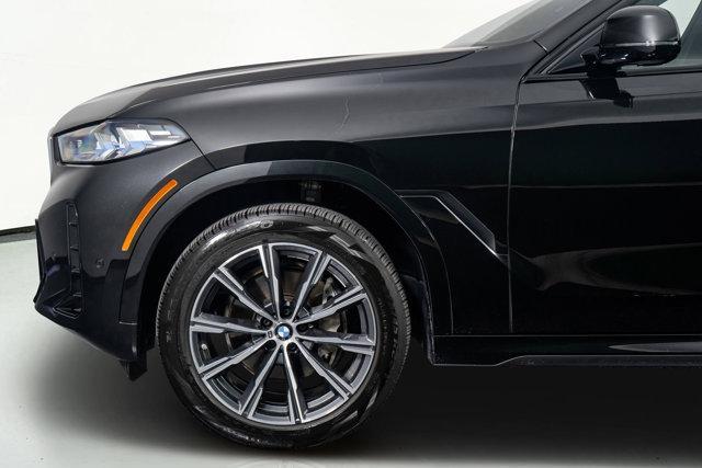 used 2025 BMW X6 car, priced at $73,998