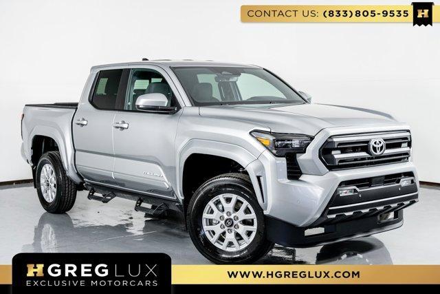used 2024 Toyota Tacoma car, priced at $59,998