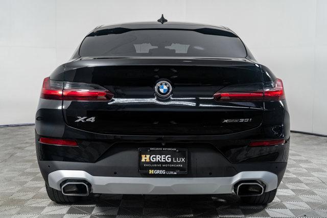 used 2025 BMW X4 car, priced at $54,998