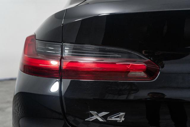 used 2025 BMW X4 car, priced at $54,998