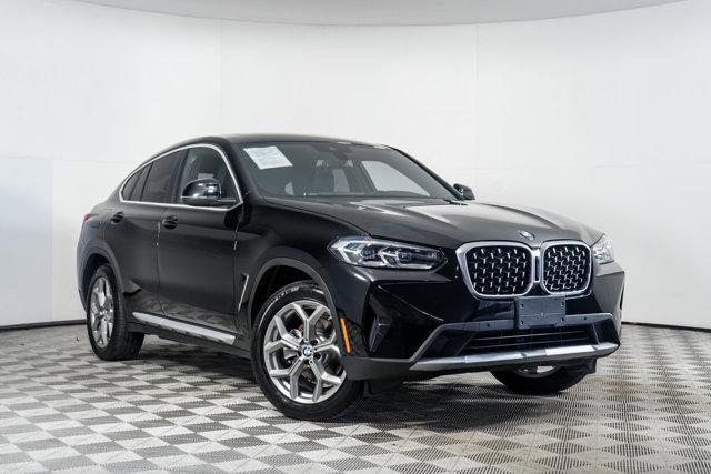 used 2025 BMW X4 car, priced at $54,998