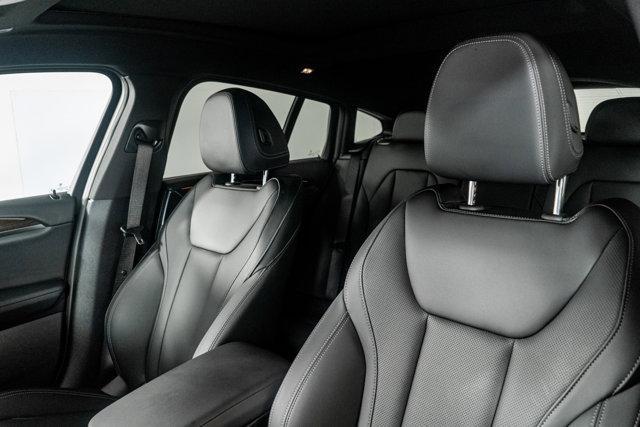 used 2025 BMW X4 car, priced at $54,998