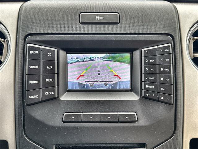 used 2014 Ford F-150 car, priced at $20,000
