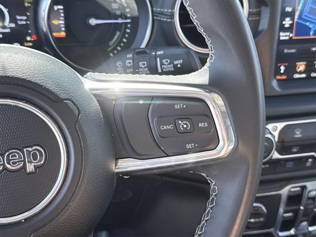 used 2023 Jeep Wrangler 4xe car, priced at $28,444