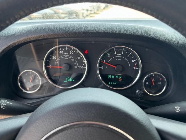 used 2014 Jeep Wrangler car, priced at $12,994