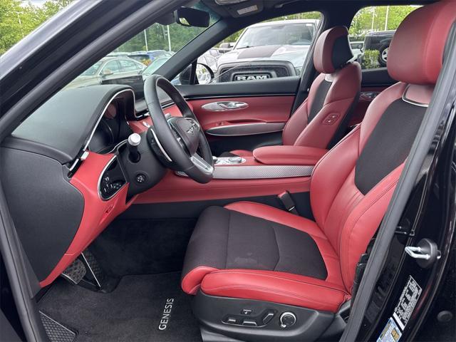 used 2024 Genesis GV70 car, priced at $51,444