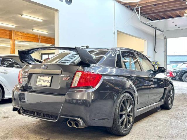 used 2011 Subaru Impreza WRX STi car, priced at $19,900