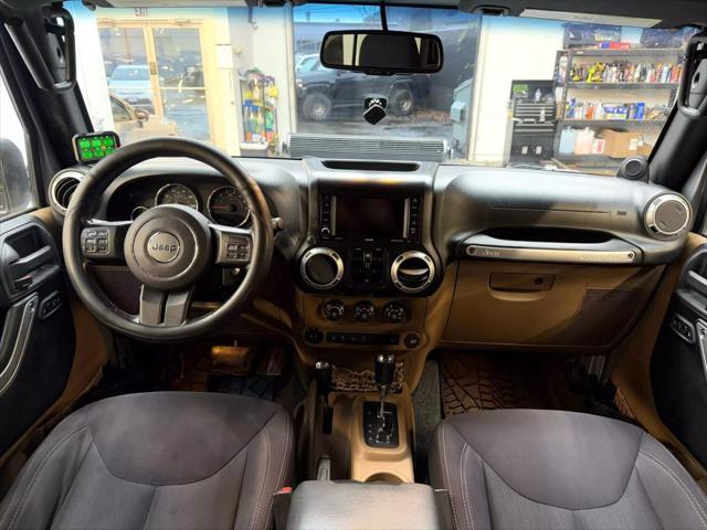 used 2013 Jeep Wrangler Unlimited car, priced at $18,900