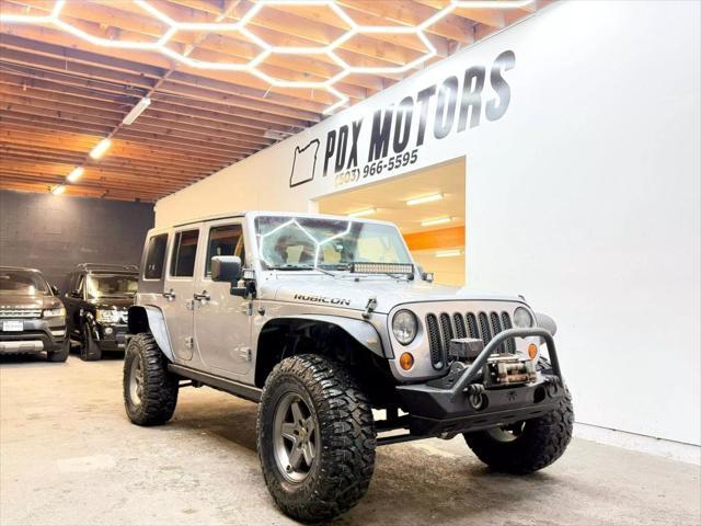 used 2013 Jeep Wrangler Unlimited car, priced at $19,900