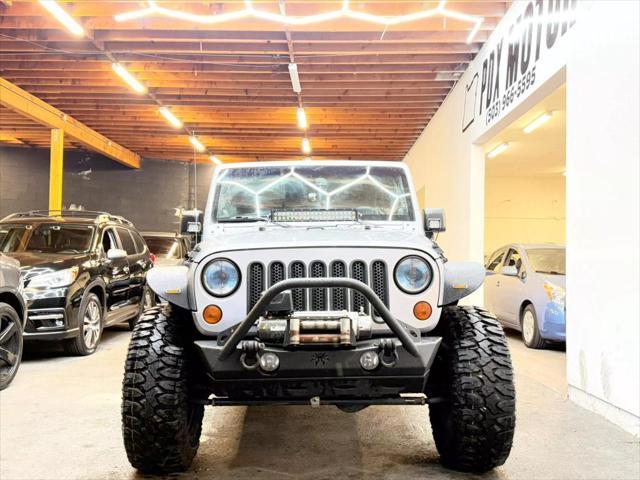 used 2013 Jeep Wrangler Unlimited car, priced at $19,900