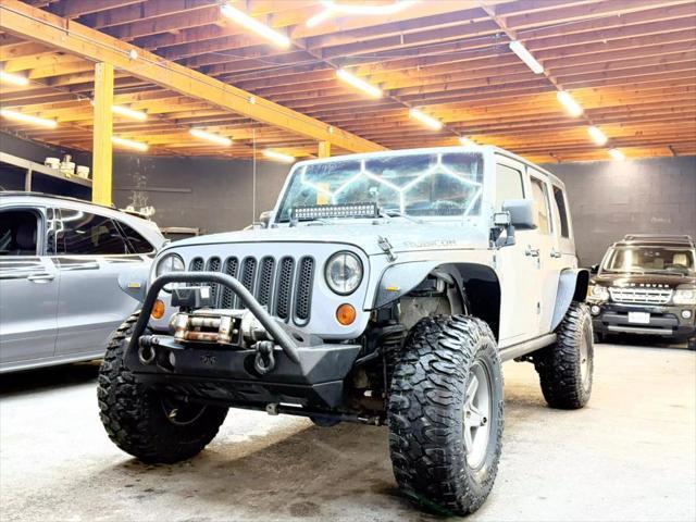 used 2013 Jeep Wrangler Unlimited car, priced at $19,900