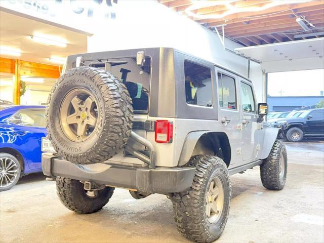 used 2013 Jeep Wrangler Unlimited car, priced at $19,900