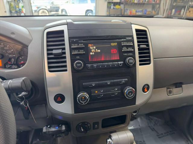 used 2013 Nissan Frontier car, priced at $15,500