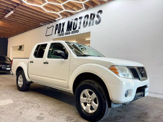 used 2013 Nissan Frontier car, priced at $15,500
