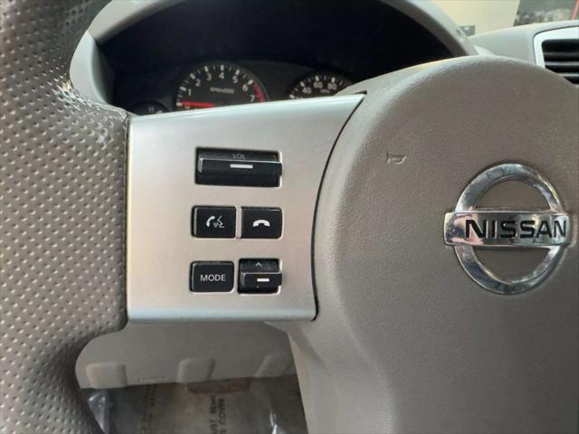 used 2013 Nissan Frontier car, priced at $15,500
