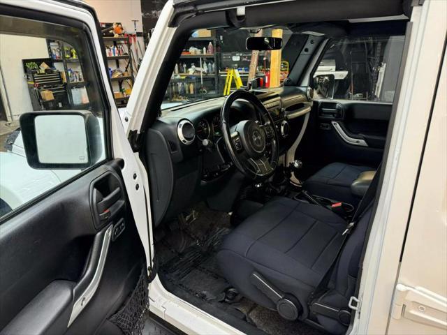 used 2011 Jeep Wrangler Unlimited car, priced at $14,900