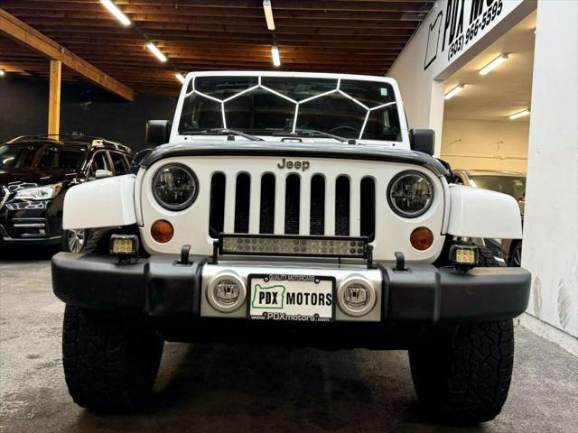 used 2011 Jeep Wrangler Unlimited car, priced at $14,900